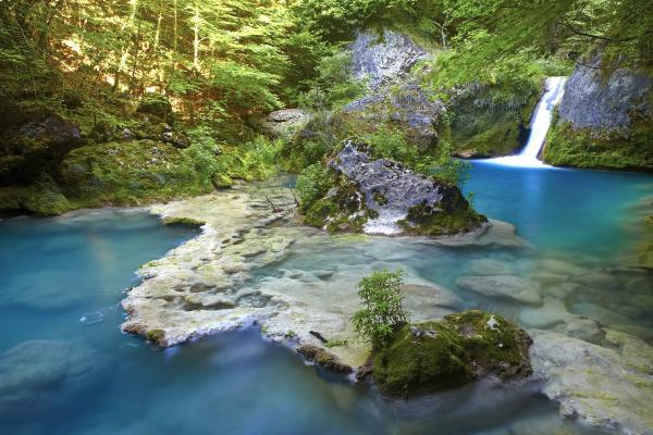 Crystal clear waters and waterfall